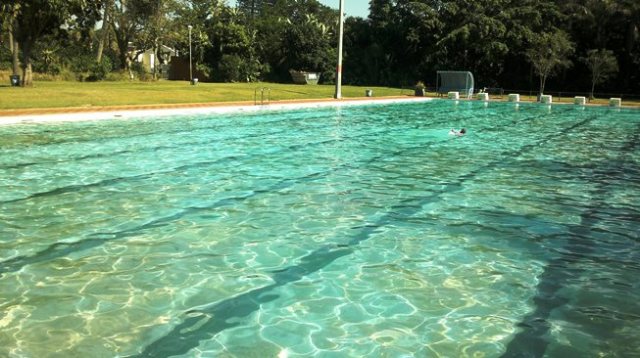 Six-year-old granddaughter R will try, on Thursday, for her 1500 metre swimming badge.  The distant dot is her practising today with a swim of one Kilometre - that's 20 times up and down that pool!